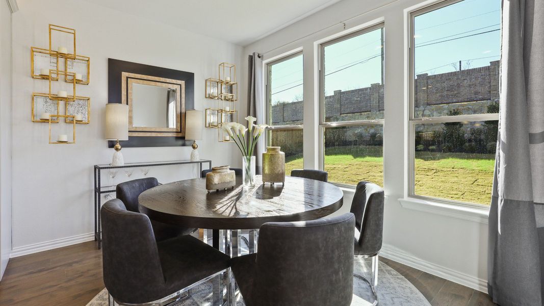 Representative furnished interior of a home built from the Hickory by Brightland Homes in Sunterra, Katy (Image 7).