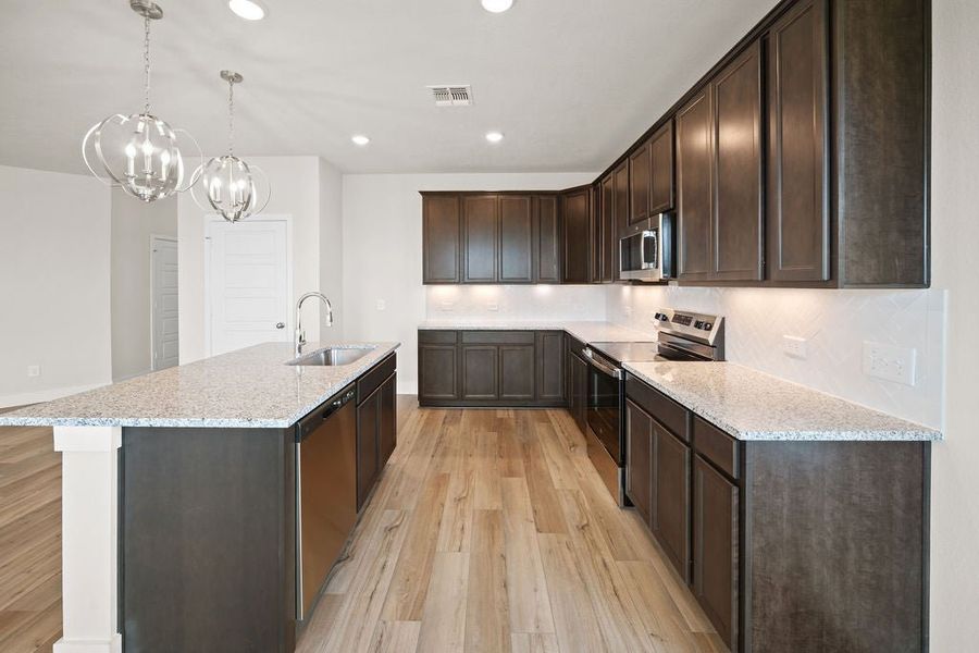 Furnished interior view inside a new home in Wellington Place, Tyler (Image 3).