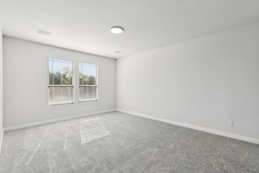 Primary Suite in the Winters home plan by Trophy Signature Homes – REPRESENTATIVE PHOTO