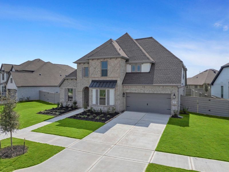 Front exterior of a new home in Pomona 60', Manvel, TX, highlighting curb appeal (Image 14).