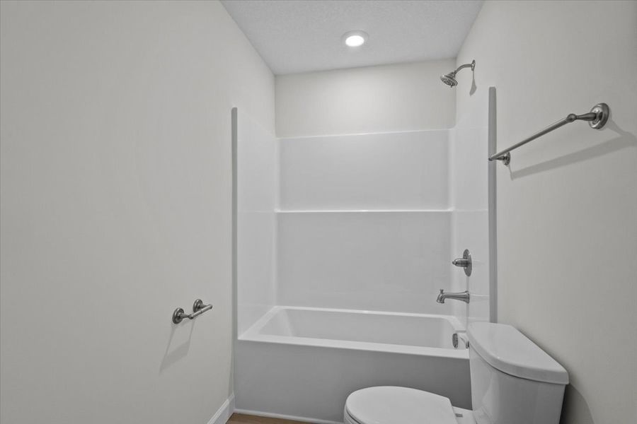 Representative furnished interior of a home built from the Roebuck by Enchanted Homes in Las Palomas Country Club Estates, La Vernia (Image 15).