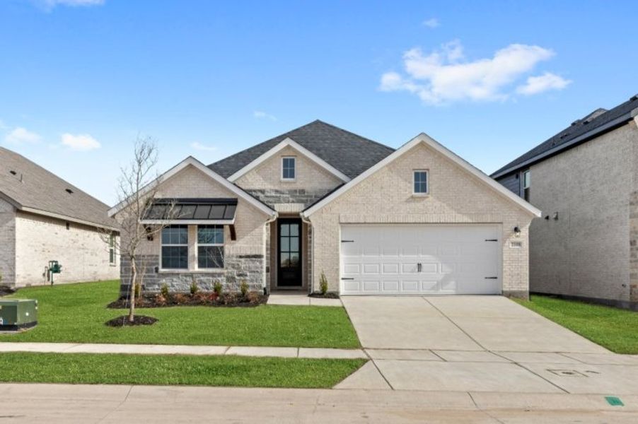 Representative exterior photo of a completed home built from the Rio Grande by UnionMain Homes in Elevon, Lavon, TX (Image 24).