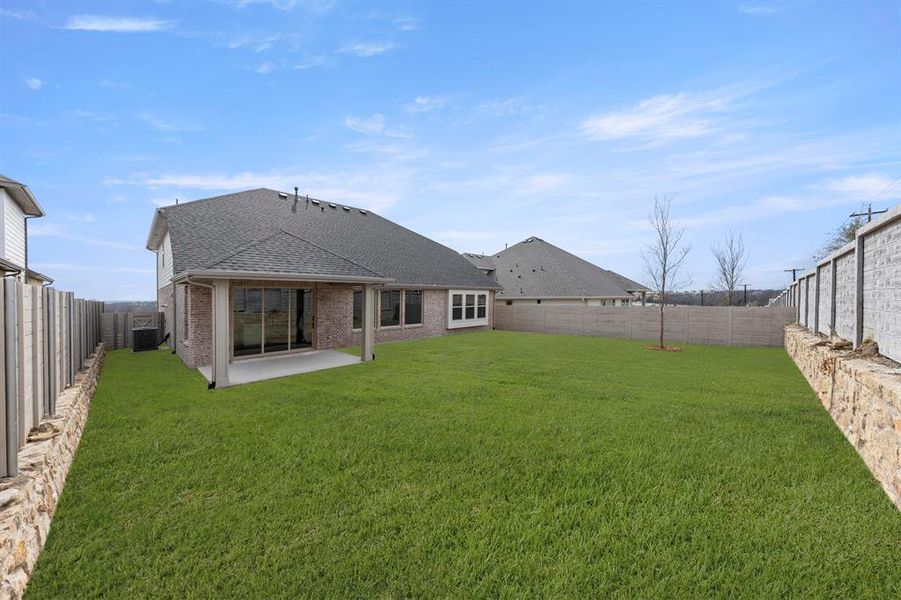 Exterior details and patio area of a home in Painted Tree, McKinney (Image 24).