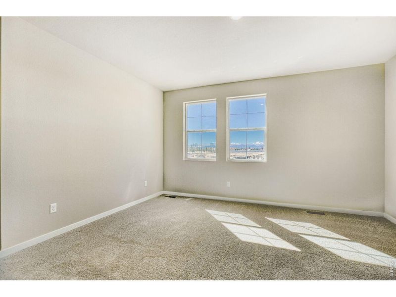 Spacious, unfurnished interior of a new home in Farmstead, Berthoud (Image 21).