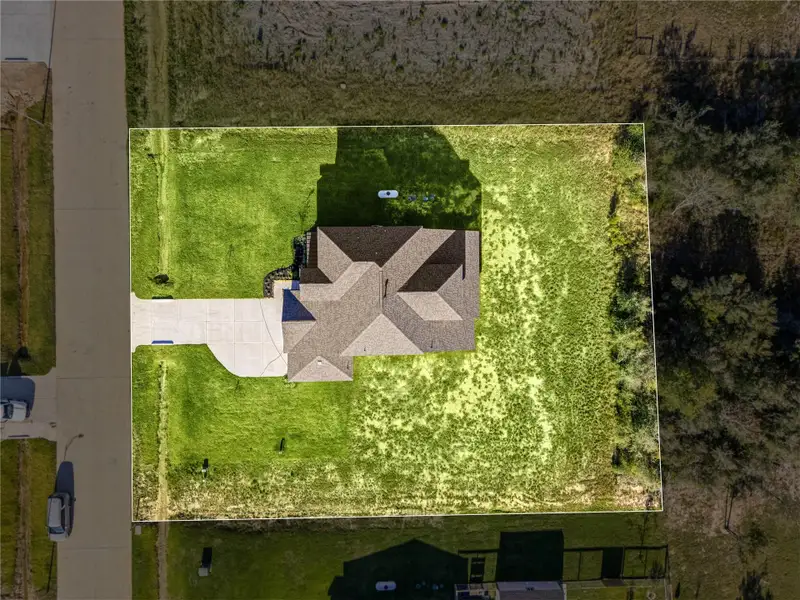 Amazing aerial shot of this gorgeous First America home situated on a lake lot on a quiet street in the sought after community of Southfork Ranch zoned to Sealy ISD! Amazing aerial shot of this gorgeous First America home situated on a lake lot on a quiet street in the sought after community of Southfork Ranch zoned to Sealy ISD!