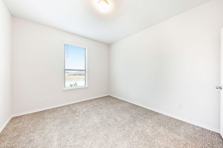 Representative exterior photo of a completed home built from the Radcliffe II by Impression Homes in Stone Eagle, Azle, TX (Image 22).