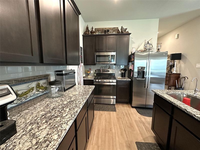 Furnished interior view inside a new home in Lone Star Landing, Montgomery (Image 5).