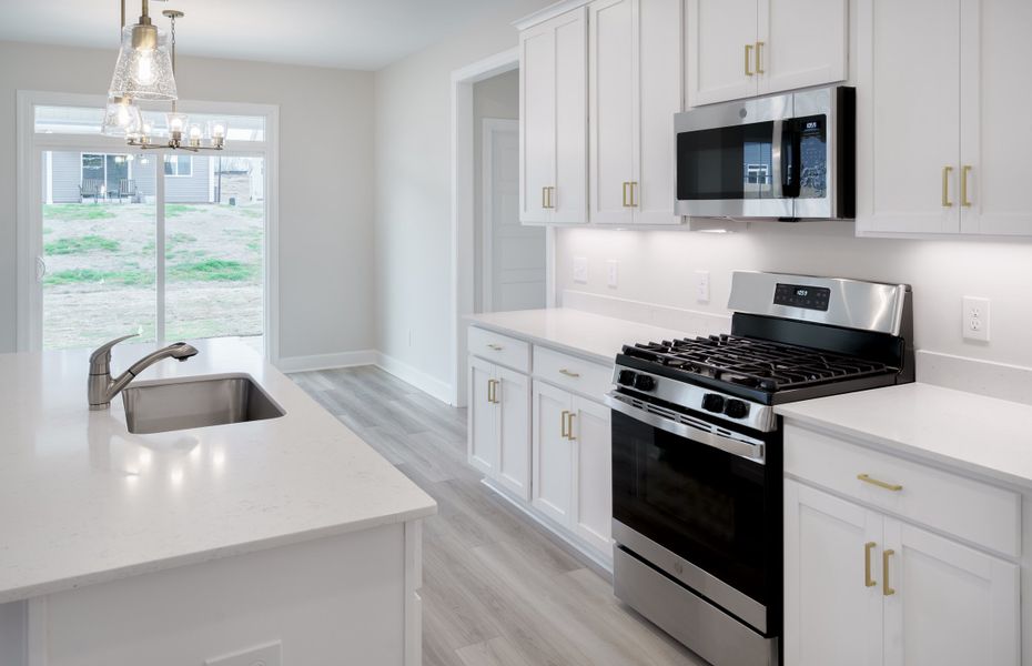 Representative furnished interior of a home built from the The McKee Manor by Cothran Homes in Holly Ridge, Greenville (Image 8). Representative furnished interior of a home built from the The McKee Manor by Cothran Homes in Holly Ridge, Greenville (Image 8).