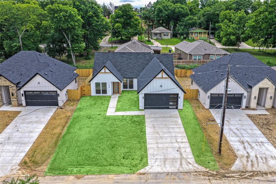 Front exterior of a new home in , Dallas, TX, highlighting curb appeal (Image 17).