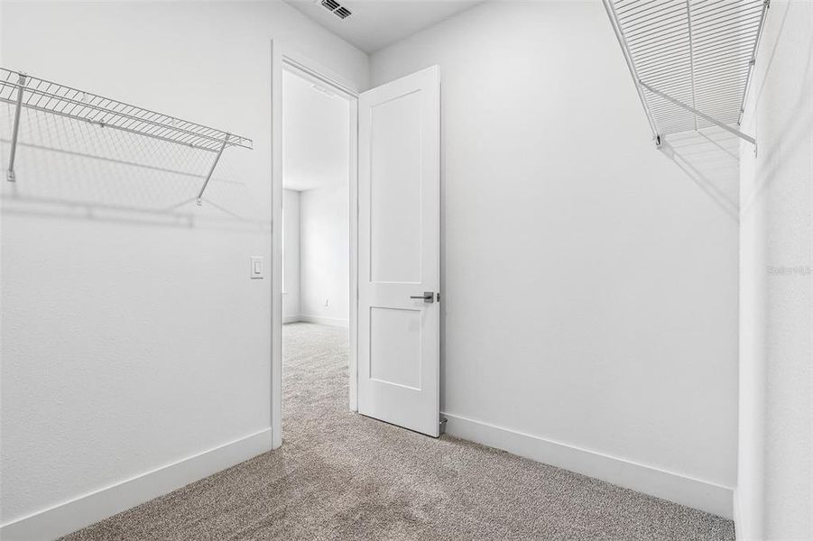 Spacious, unfurnished interior of a new home in Lakeside at Satilla, St. Cloud (Image 25).