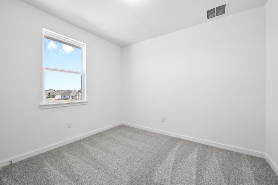 Spacious, unfurnished interior of a new home in The Porch at Du Pre, Buda (Image 18).