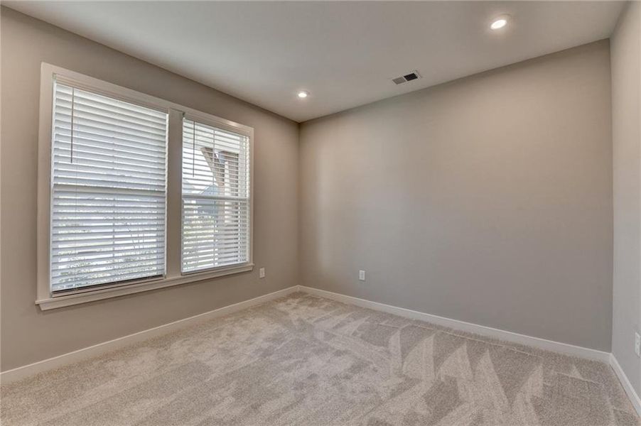 Spacious, unfurnished interior of a new home in The Reserve At Liberty Park, Braselton (Image 26).
