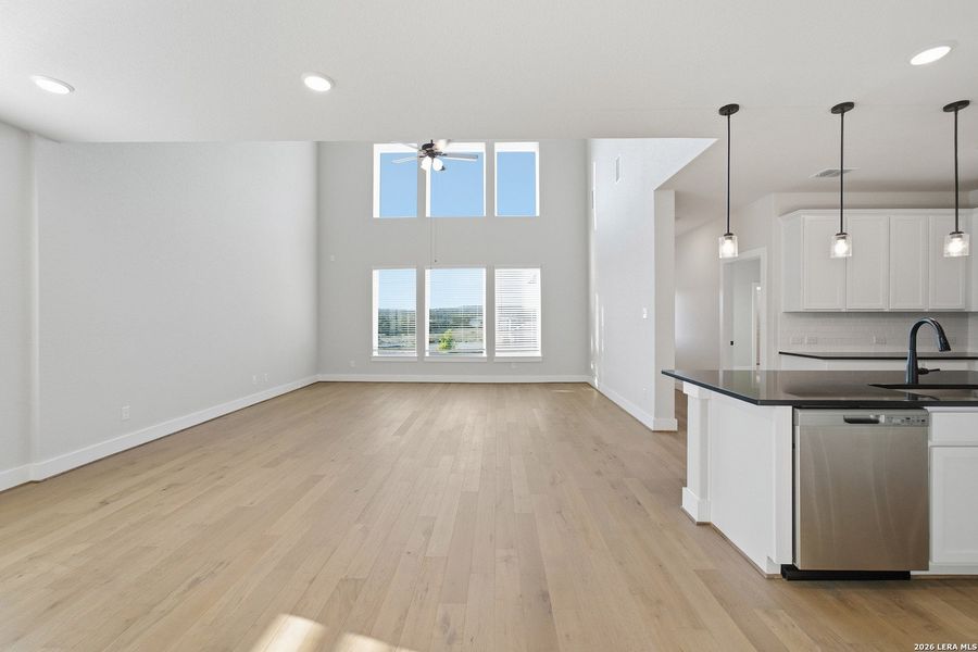 Spacious, unfurnished interior of a new home in The Woodlands at Medina Hills, Mico (Image 28).