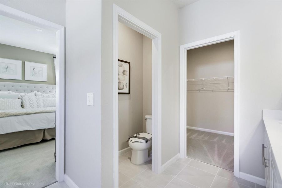 Primary bathroom and walk-in closet