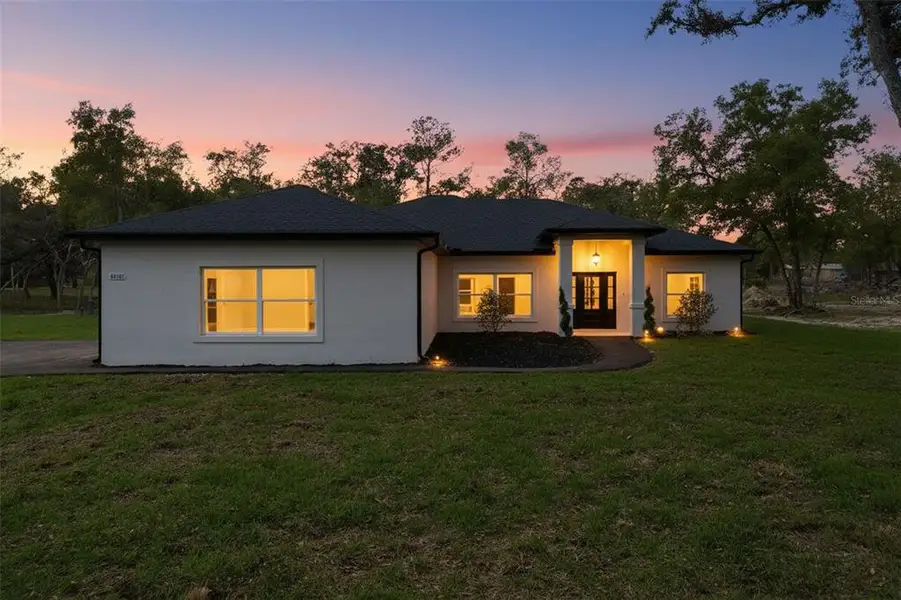 Exterior details and patio area of a home in , Webster (Image 34).