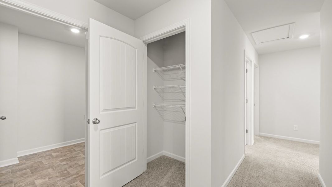 Representative unfurnished interior of a home built from the Robie by D.R. Horton in Parkside at Carter Grove, Cartersville (Image 25). Representative unfurnished interior of a home built from the Robie by D.R. Horton in Parkside at Carter Grove, Cartersville (Image 25).