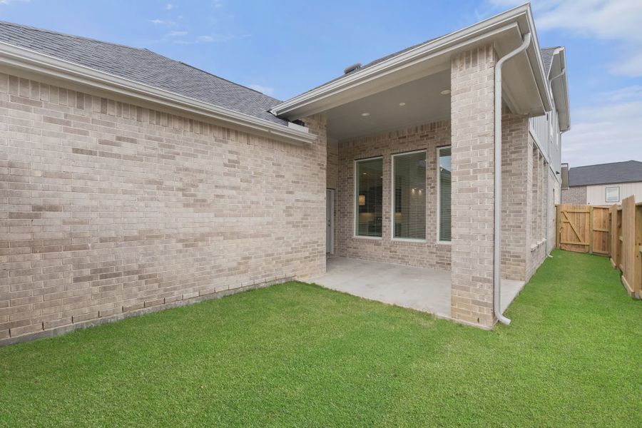 Representative exterior details of a home built from the St Andrews by Chesmar Homes in Riceland Alley Loads, Mont Belvieu (Image 37).