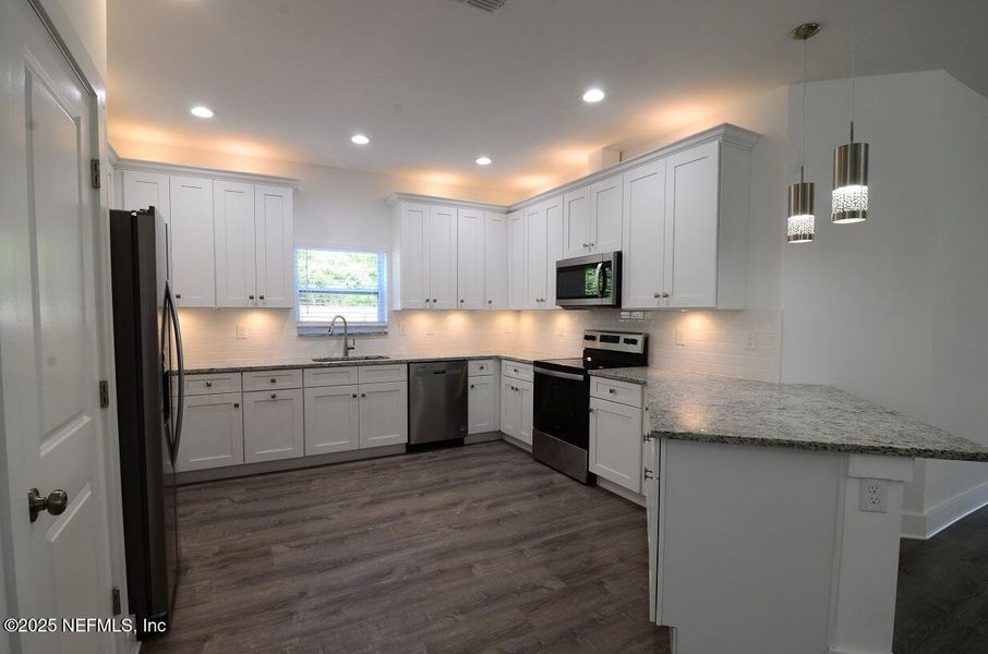 Furnished interior view inside a new home in , Jacksonville (Image 11). Furnished interior view inside a new home in , Jacksonville (Image 11).
