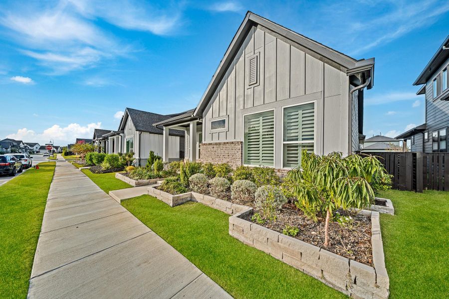 Front exterior of a new home in , Cypress, TX, highlighting curb appeal (Image 22). Front exterior of a new home in , Cypress, TX, highlighting curb appeal (Image 22).