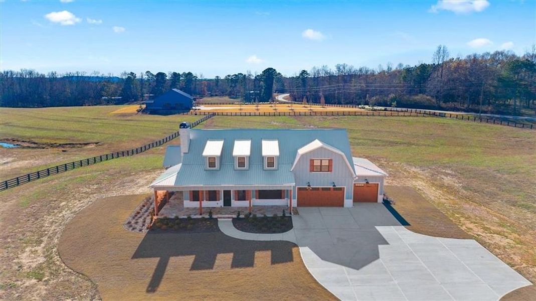 Front exterior of a new home in , Bremen, GA, highlighting curb appeal (Image 23).