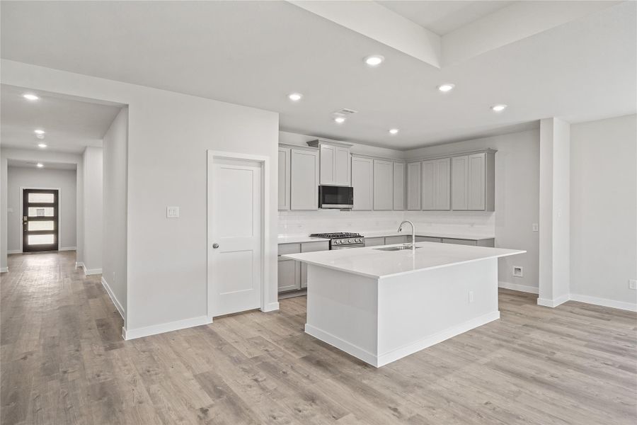 Furnished interior view inside a new home in Sunterra, Katy (Image 9).