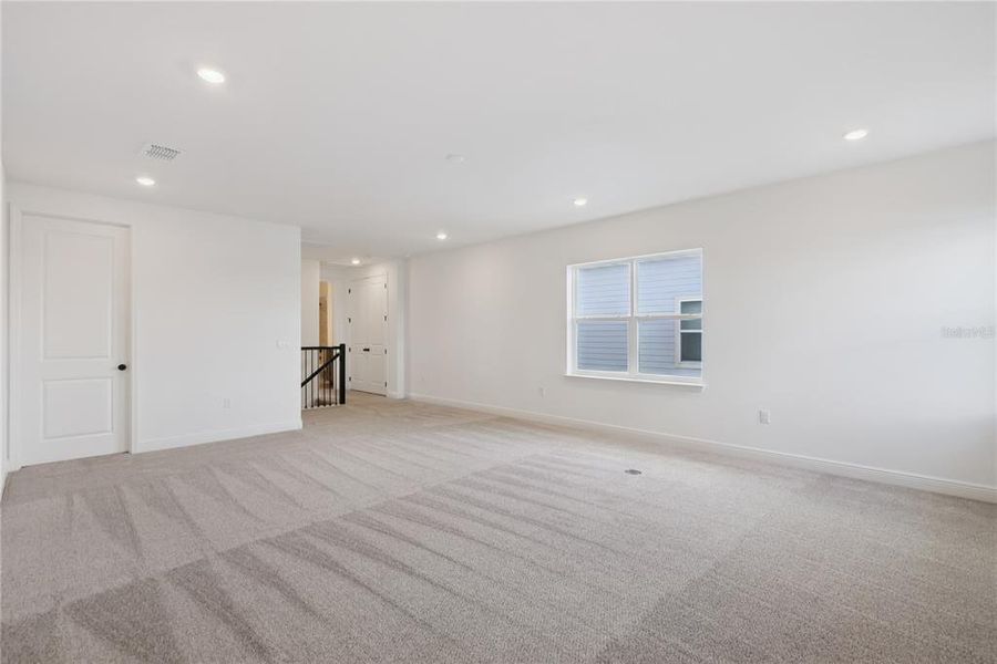 Spacious, unfurnished interior of a new home in Laureate Park, Orlando (Image 42).