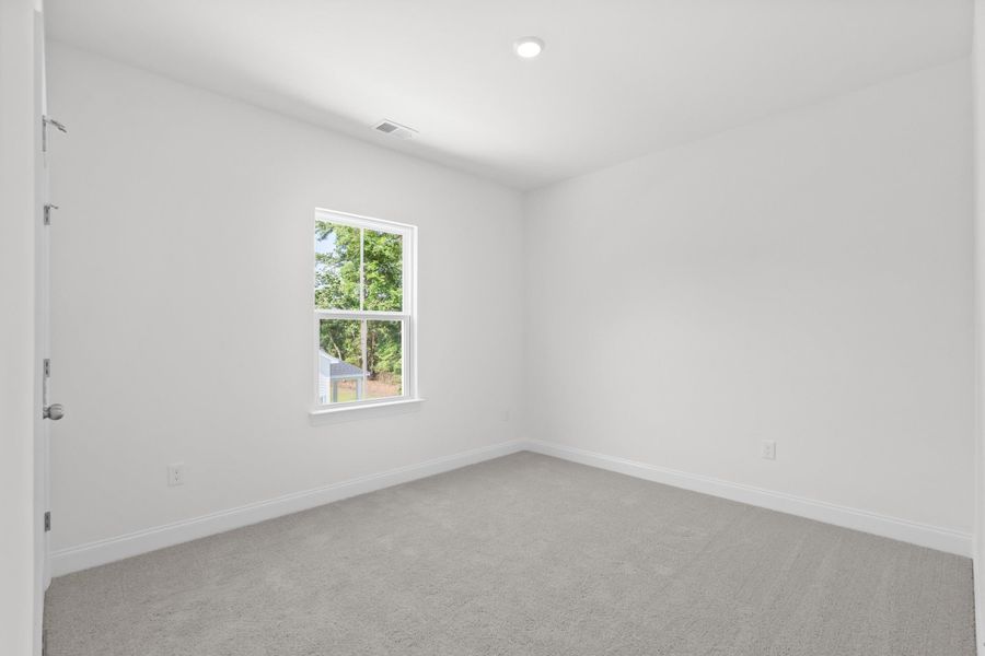 Spacious, unfurnished interior of a new home in Downtown Loris Homes, Loris (Image 43).