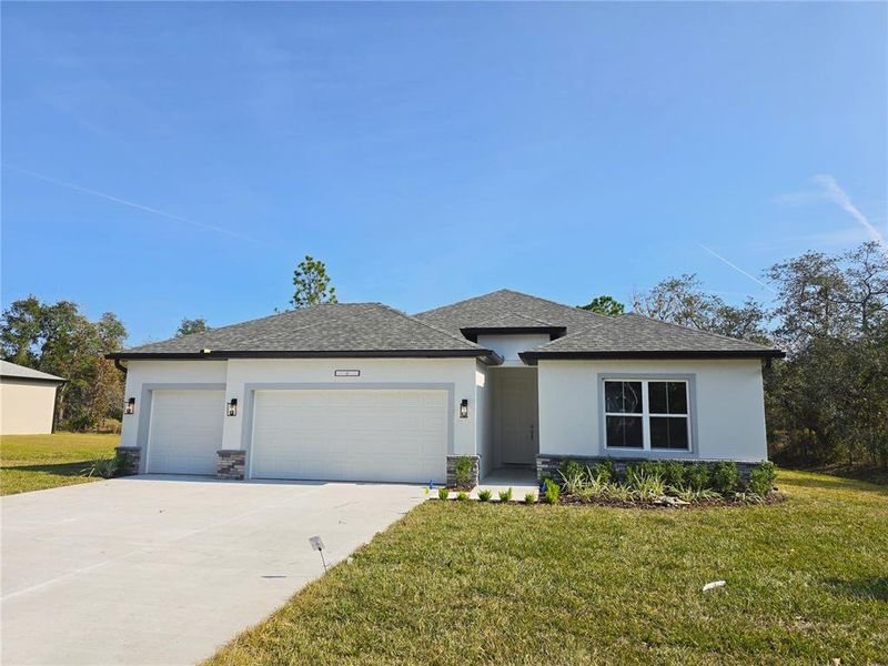 Front exterior of a new home in , Homosassa, FL, highlighting curb appeal (Image 31).