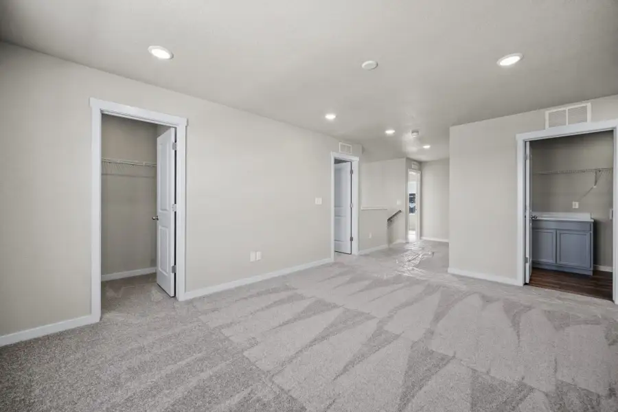 Spacious, unfurnished interior of a new home in The Glen, Colorado Springs (Image 23).