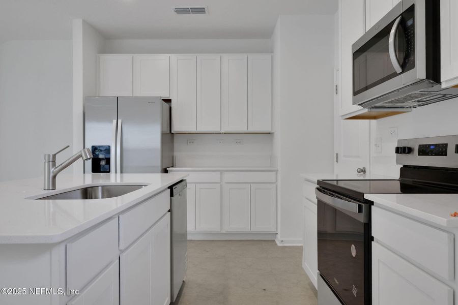 Furnished interior view inside a new home in , Middleburg (Image 8). Furnished interior view inside a new home in , Middleburg (Image 8).