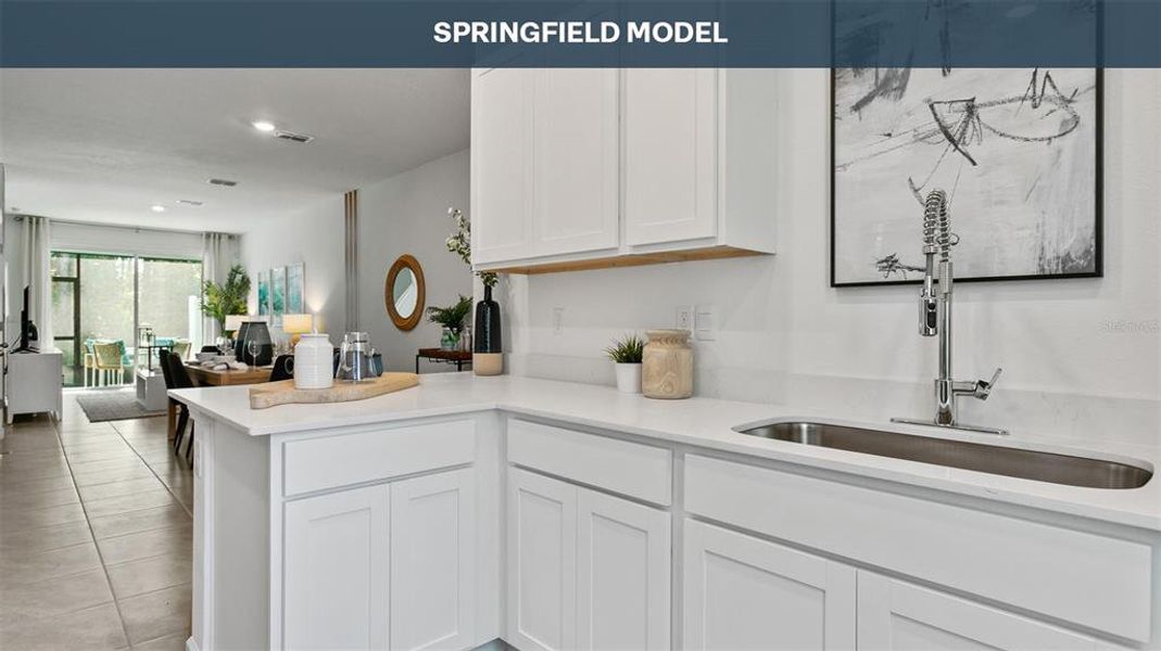 Furnished interior view inside a new home in Cordera Townhomes, St. Augustine (Image 8).