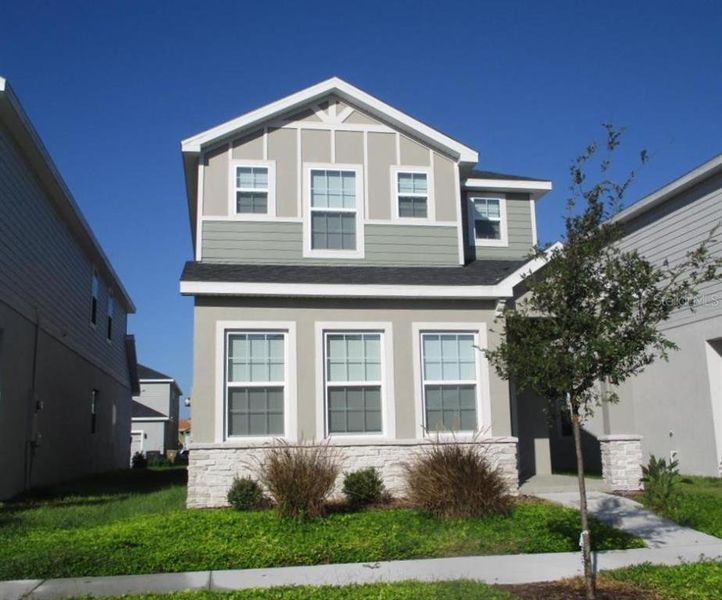 Front exterior of a new home in , St. Cloud, FL, highlighting curb appeal (Image 25).