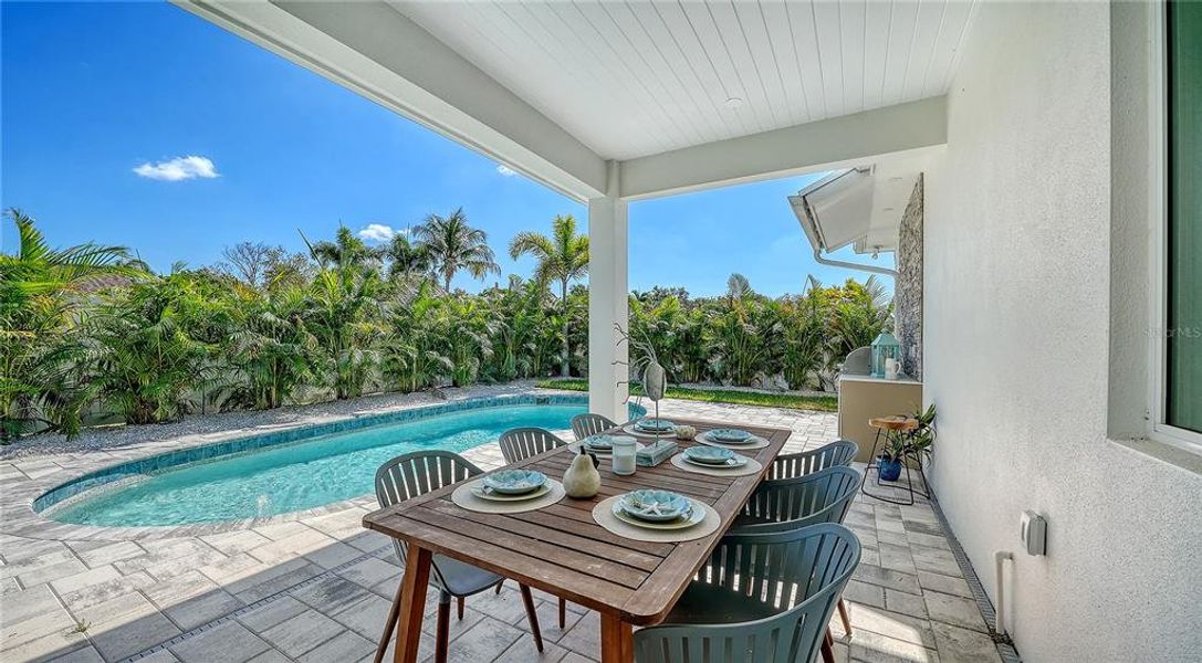 Exterior details and patio area of a home in , Bradenton (Image 27).