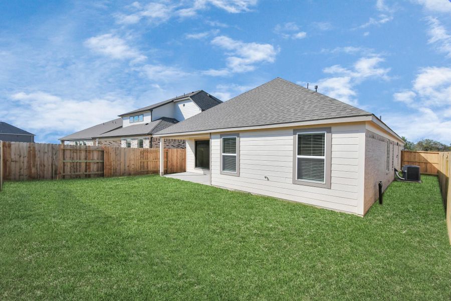Come and see this spacious backyard with its beautiful covered patio. There is plenty ofroom for the kids to play and adults to relax. Perfect for your outdoor living space, patiofurniture, bbq pit, and so much more. The possibilities are endless!