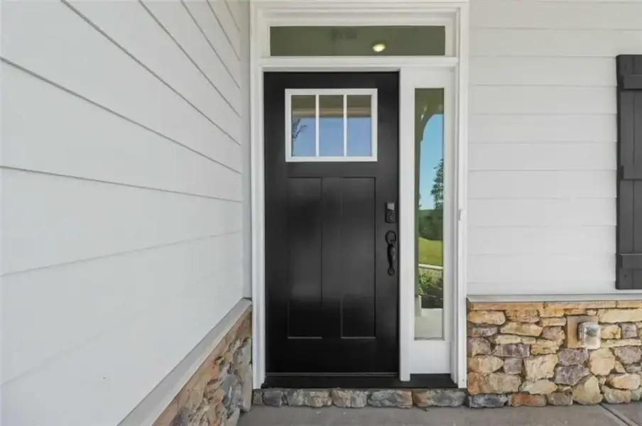 Exterior details and patio area of a home in Thunder Ridge, Dawsonville (Image 4).