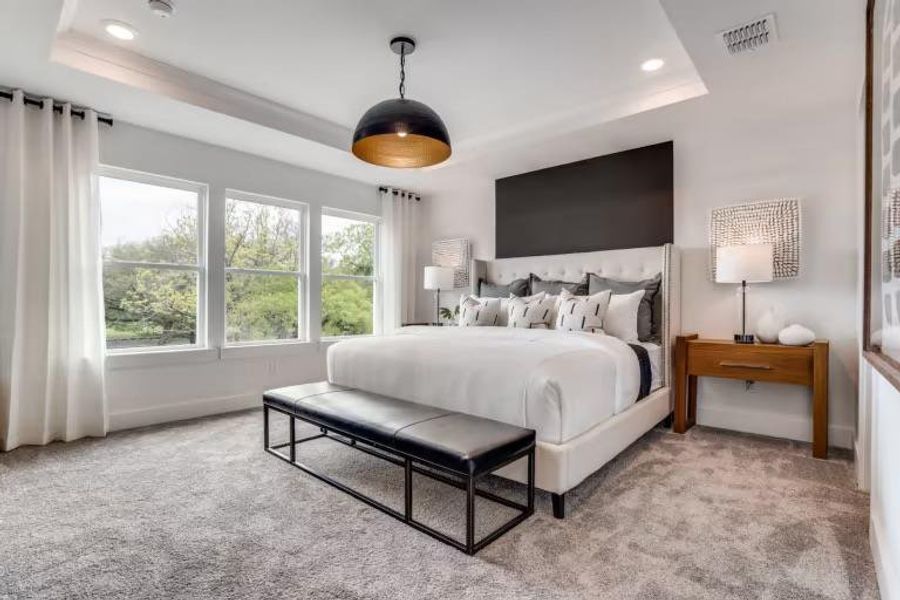 Photo of Pulte model home with same floor plan, not of actual home listed.