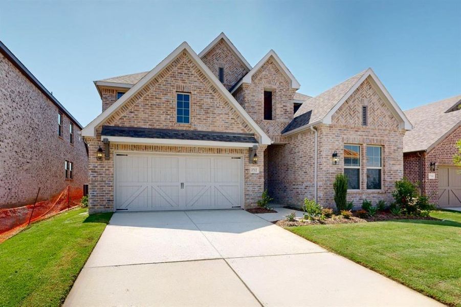 Front exterior of a new home in Lilybrooke at Legacy Hills, Celina, TX, highlighting curb appeal (Image 18). Front exterior of a new home in Lilybrooke at Legacy Hills, Celina, TX, highlighting curb appeal (Image 18).