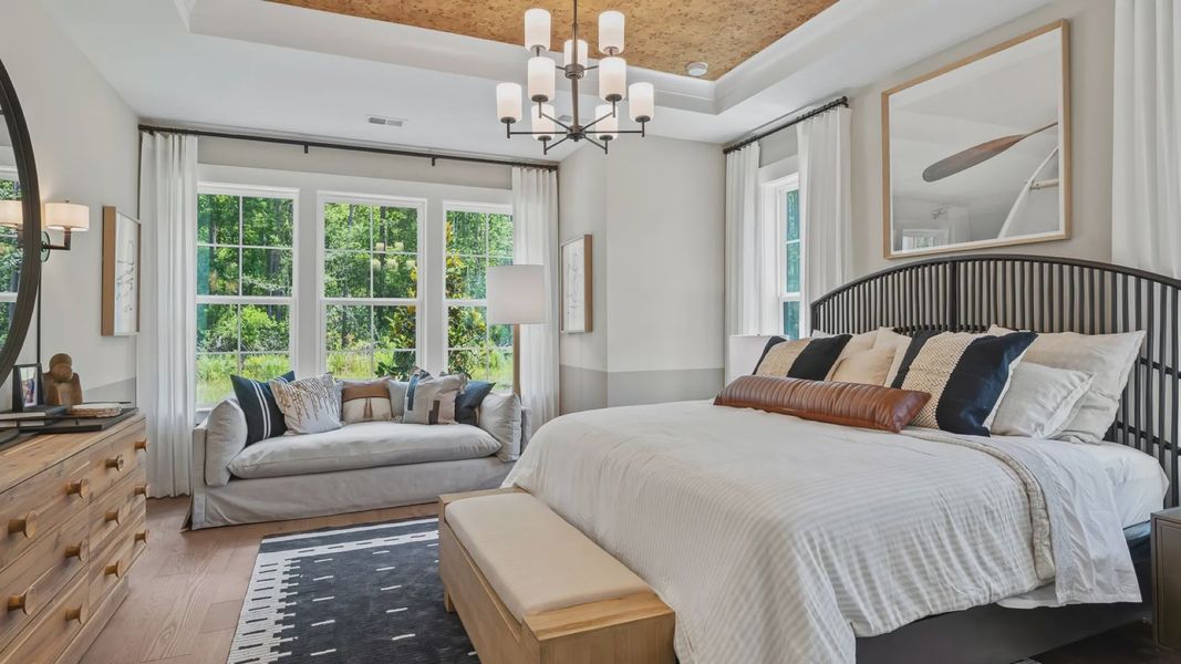 Furnished interior view inside a new home in Summerwind Crossing at Lakes of Cane Bay, Summerville (Image 13).