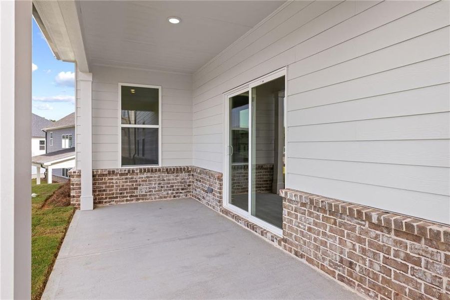Exterior details and patio area of a home in The Estates at Gainesville Township, Gainesville (Image 2).