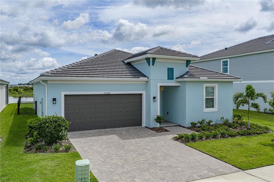 Front exterior of a new home in , San Antonio, FL, highlighting curb appeal (Image 22).