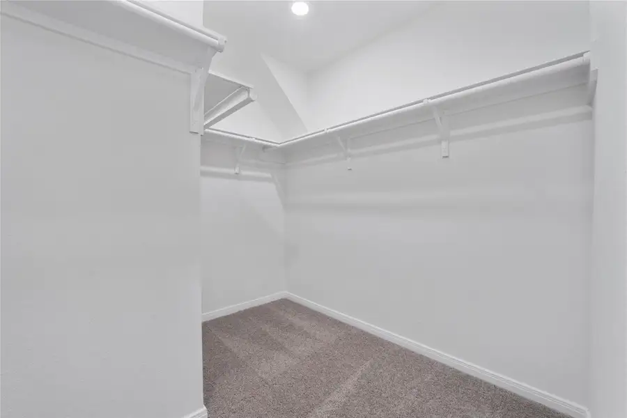 Look at this immaculate closet! With high shelving, multiple rows to hang clothing, you are sure to have enough room for all your belongings! Look at this immaculate closet! With high shelving, multiple rows to hang clothing, you are sure to have enough room for all your belongings!