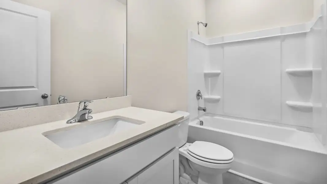 Furnished interior view inside a new home in The Townes at Madden West, Fuquay Varina (Image 7).