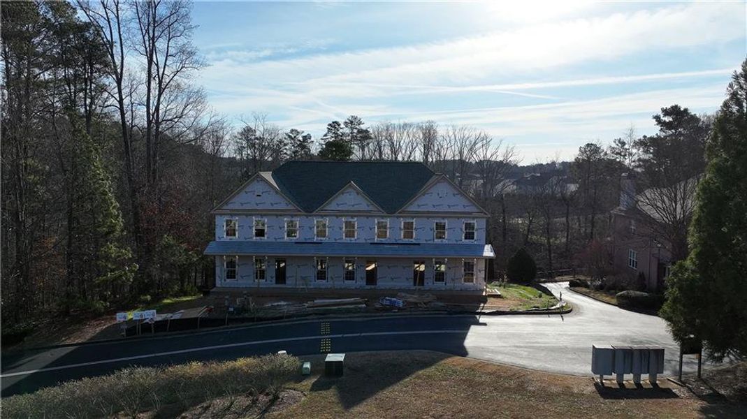 Front exterior of a new home in , Cumming, GA, highlighting curb appeal (Image 2). Front exterior of a new home in , Cumming, GA, highlighting curb appeal (Image 2).