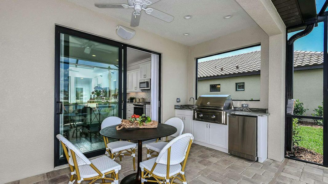 Exterior details and patio area of a home in Vicenza Real Estate and Homes for Sale in North Venice, FL - Neal Communities, Nokomis (Image 4). Exterior details and patio area of a home in Vicenza Real Estate and Homes for Sale in North Venice, FL - Neal Communities, Nokomis (Image 4).