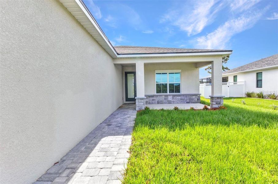 Front exterior of a new home in , Rotonda West, FL, highlighting curb appeal (Image 24). Front exterior of a new home in , Rotonda West, FL, highlighting curb appeal (Image 24).