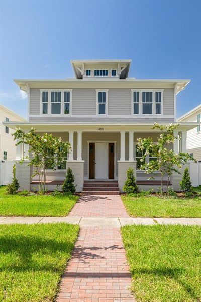 Front exterior of a new home in , St. Petersburg, FL, highlighting curb appeal (Image 1). Front exterior of a new home in , St. Petersburg, FL, highlighting curb appeal (Image 1).