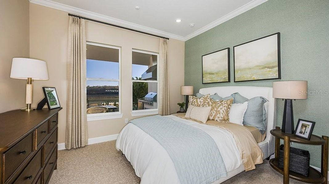 Furnished interior view inside a new home in Esplanade at McKinnon Groves, Winter Garden (Image 8).