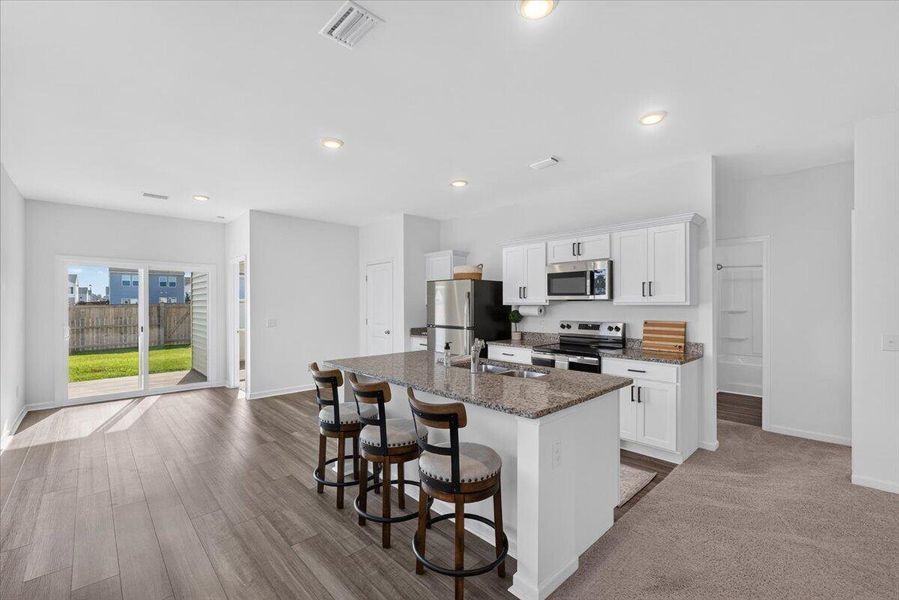 Furnished interior view inside a new home in Pender Woods at Cane Bay, Summerville (Image 13).