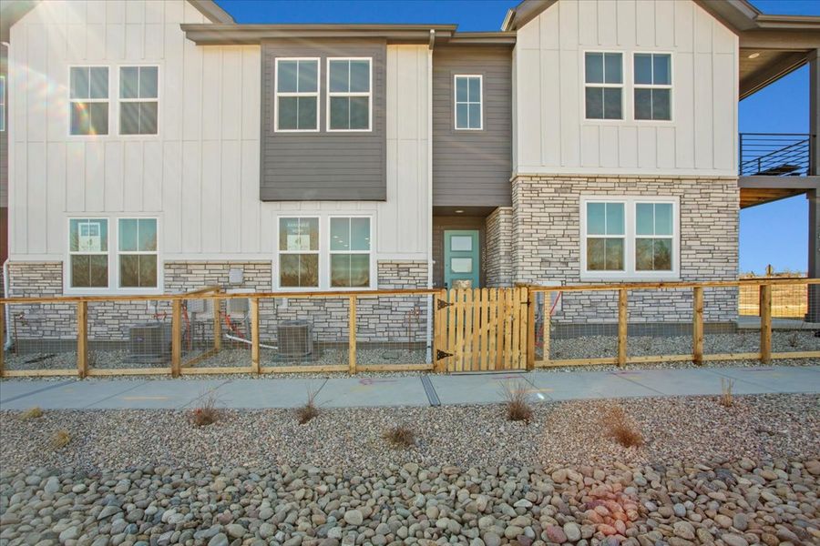 Front exterior of a new home in Arras Park, Thornton, CO, highlighting curb appeal (Image 1).