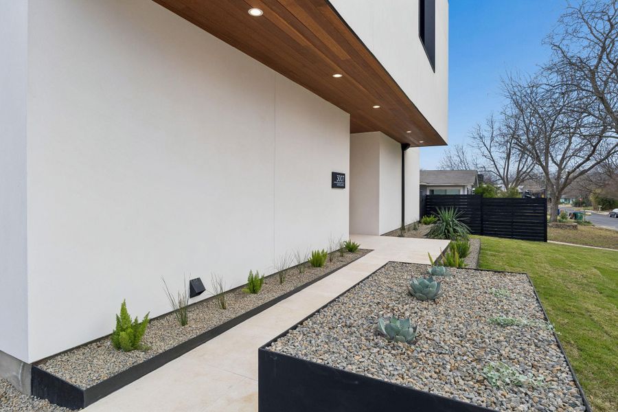 View of side of property with stucco siding
